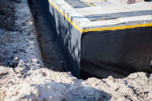 Professional Basement Waterproofing technician working in Sycamore, AL